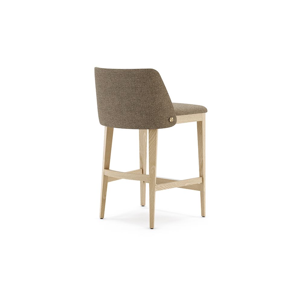 A sophisticated modern counter stool with a weave upholstery and wooden legs 