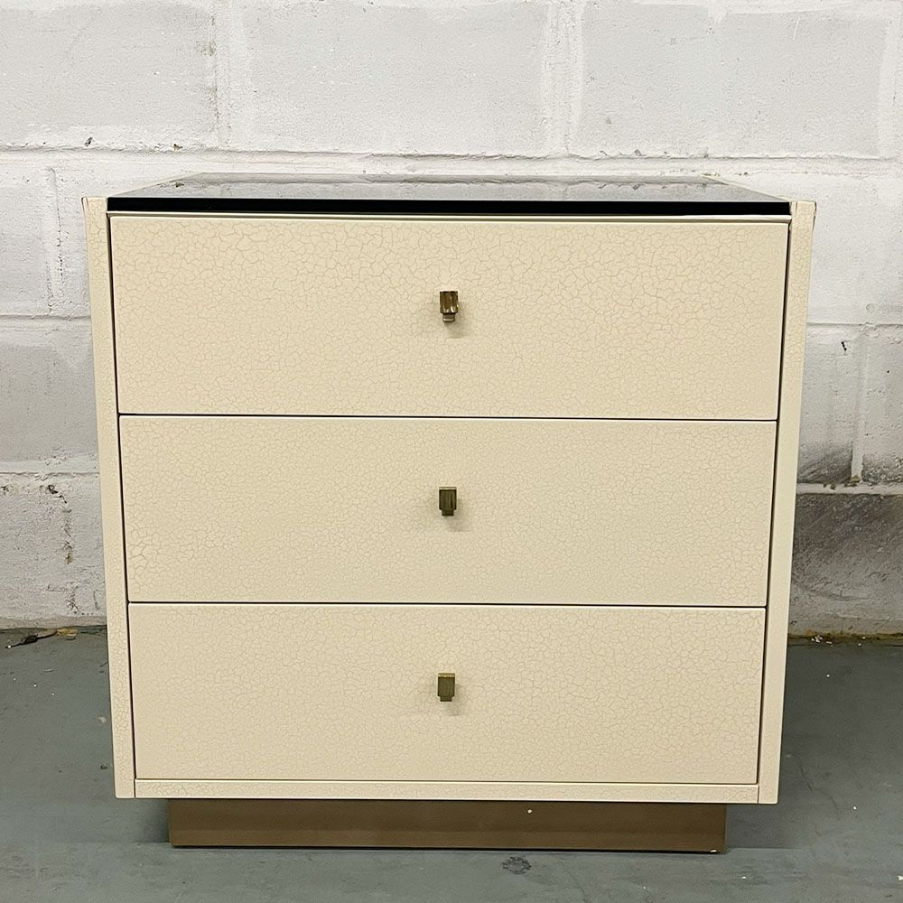Ivory coloured three drawer bedside table with chocolate coloured details