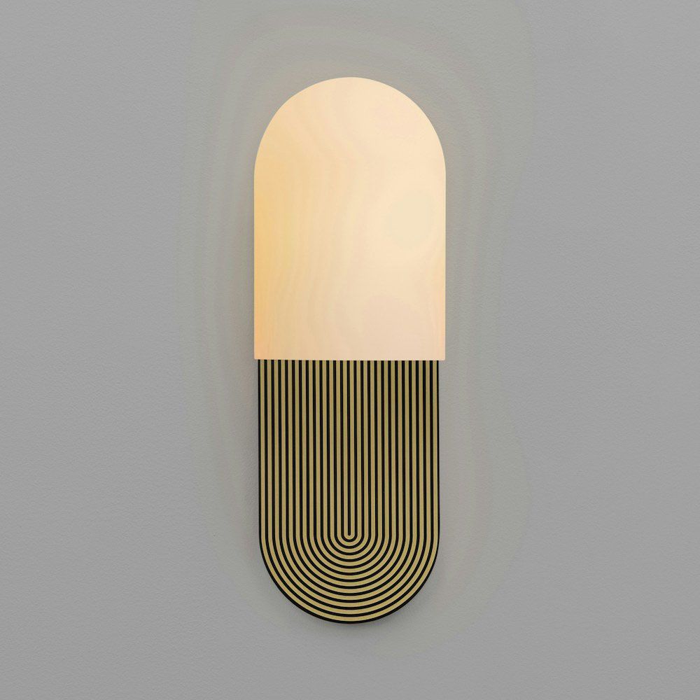 Wall sconce with a linear design engraved fitting and misted glass shade