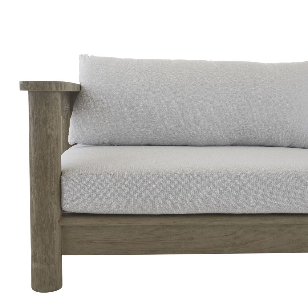 Elevate your outdoor space with the Caldwell Outdoor Sofa in Porpoise Boucle. Stylish, durable, and comfortable for any gathering. Relax in luxury!