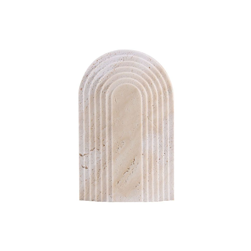 Beige travertine arch sculpture