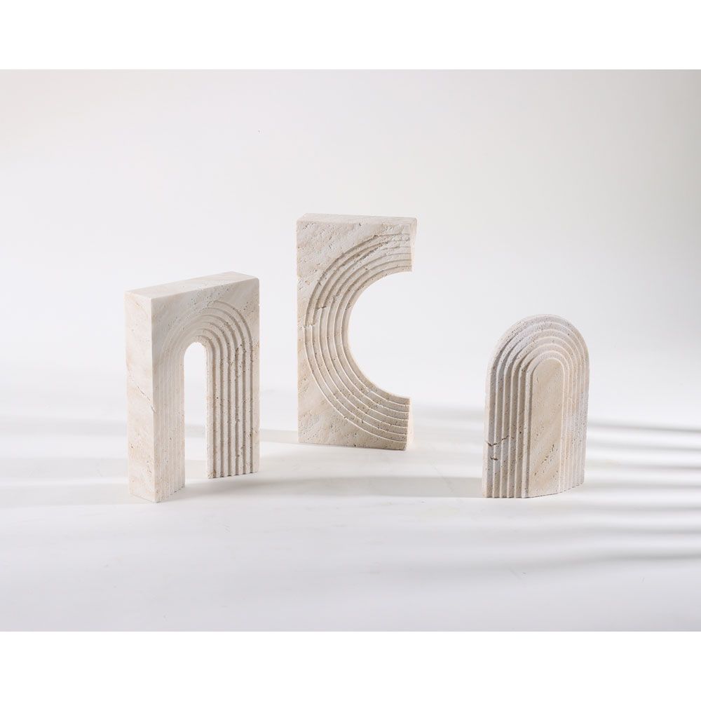Hollowed layered arches in a travertine style sculpture