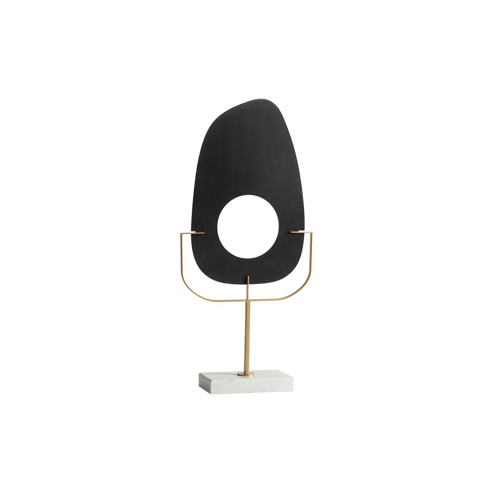 Black organic sculpture with brass stem and white base