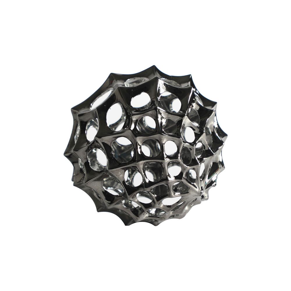 Spiked sculpture in silver with holes throughout