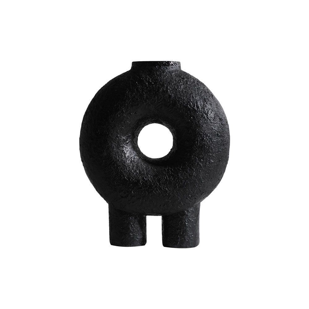 Black donut shaped vase with two feet