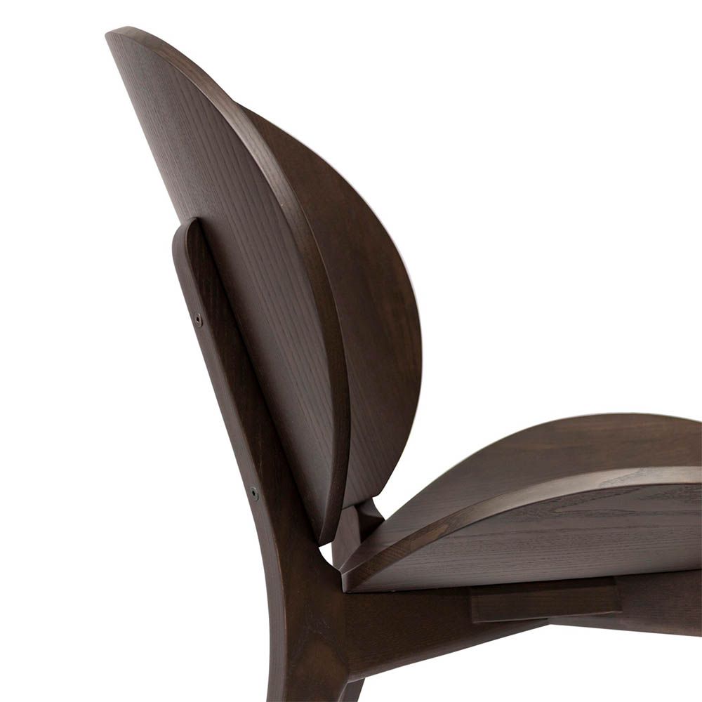 Brown wooden chair with sweeping silhouette 