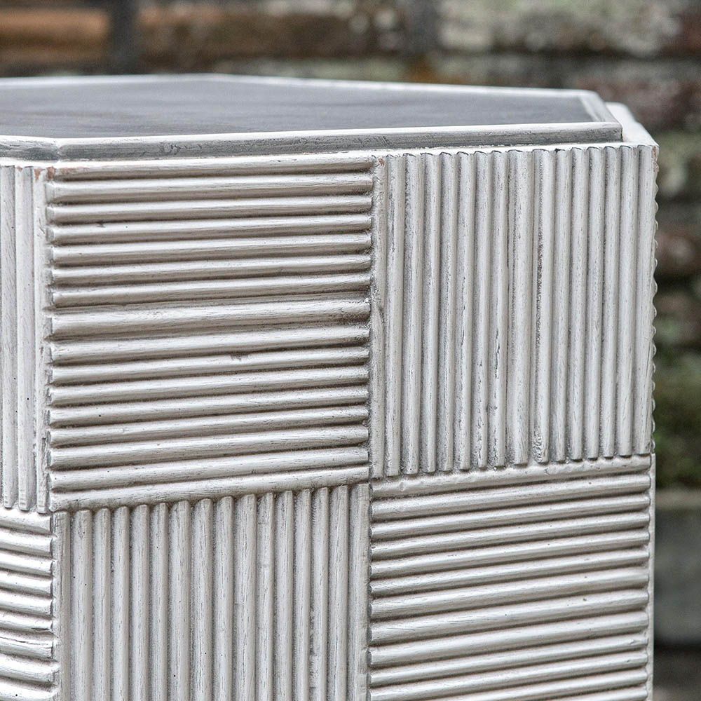 Grey hexagonal side table with reeded detailing