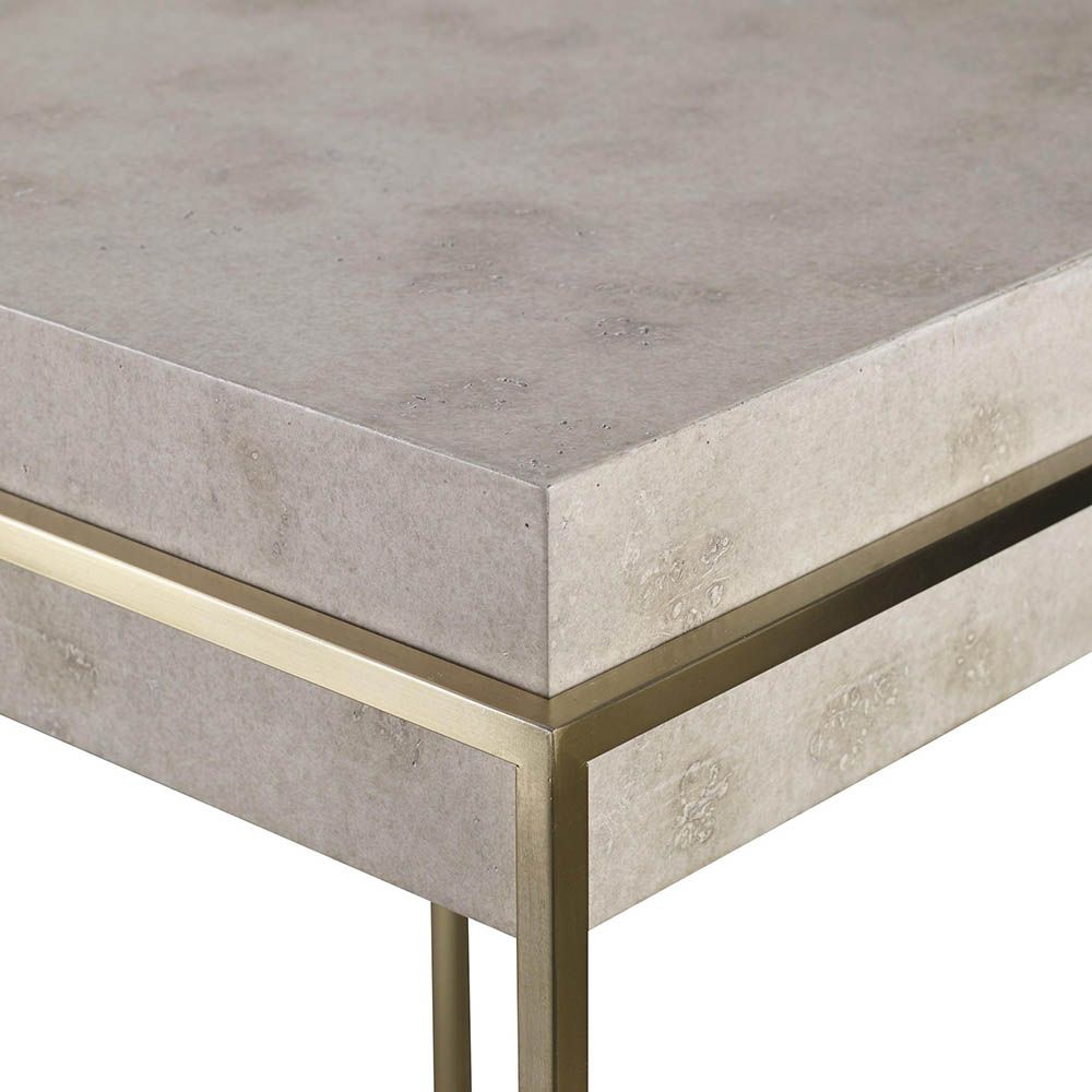 Side table with grey sunken stone top with brass frame