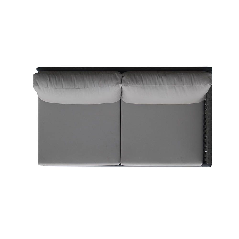 A luxury outdoor love seat from Willow's Outdoor collection with bespoke sunbrella upholstery