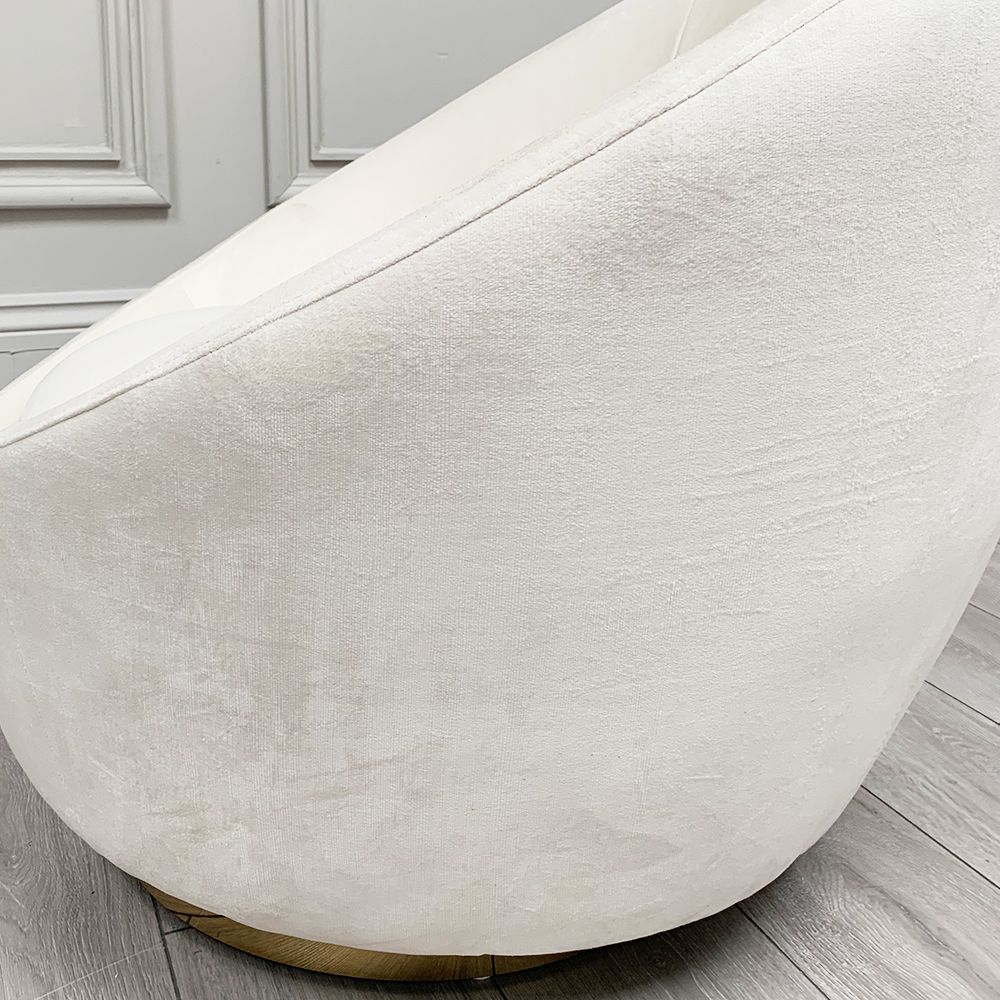 Clearance - A stunning white swivel/rocking chair with a golden base