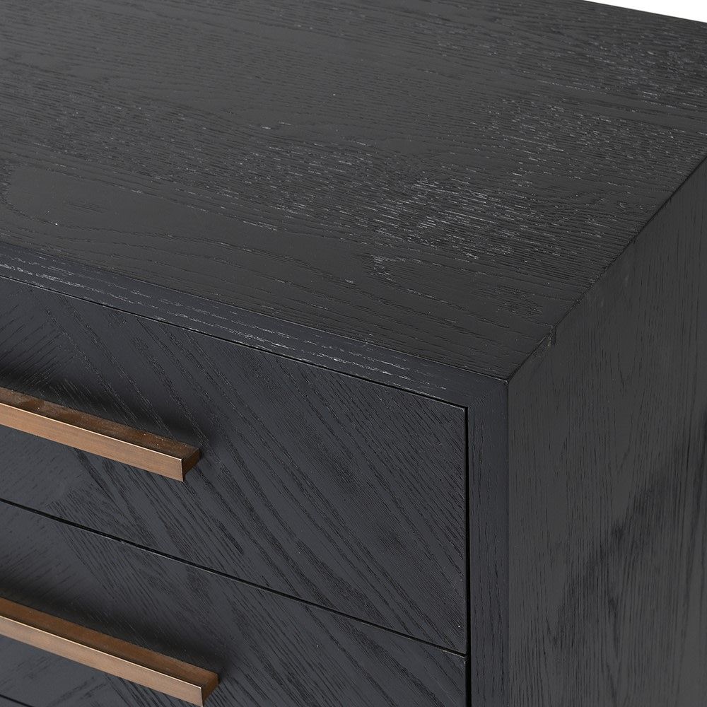Black wooden bedside table with brass handles