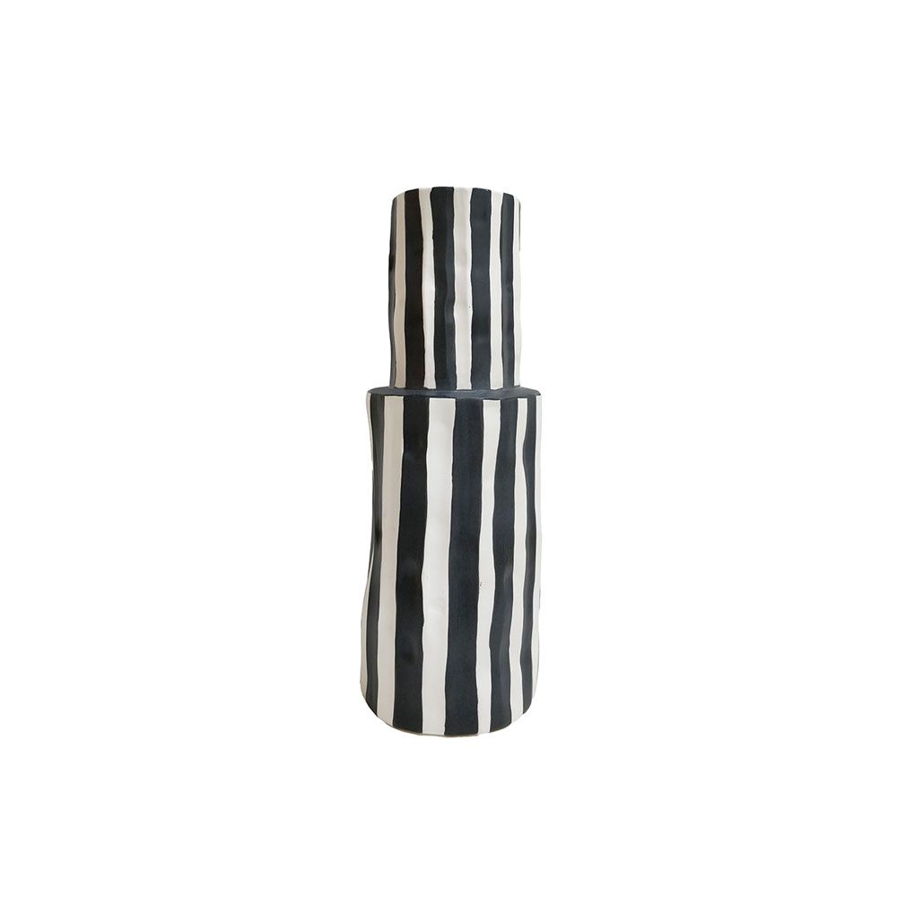 Black and white striped vase with tall silhouette