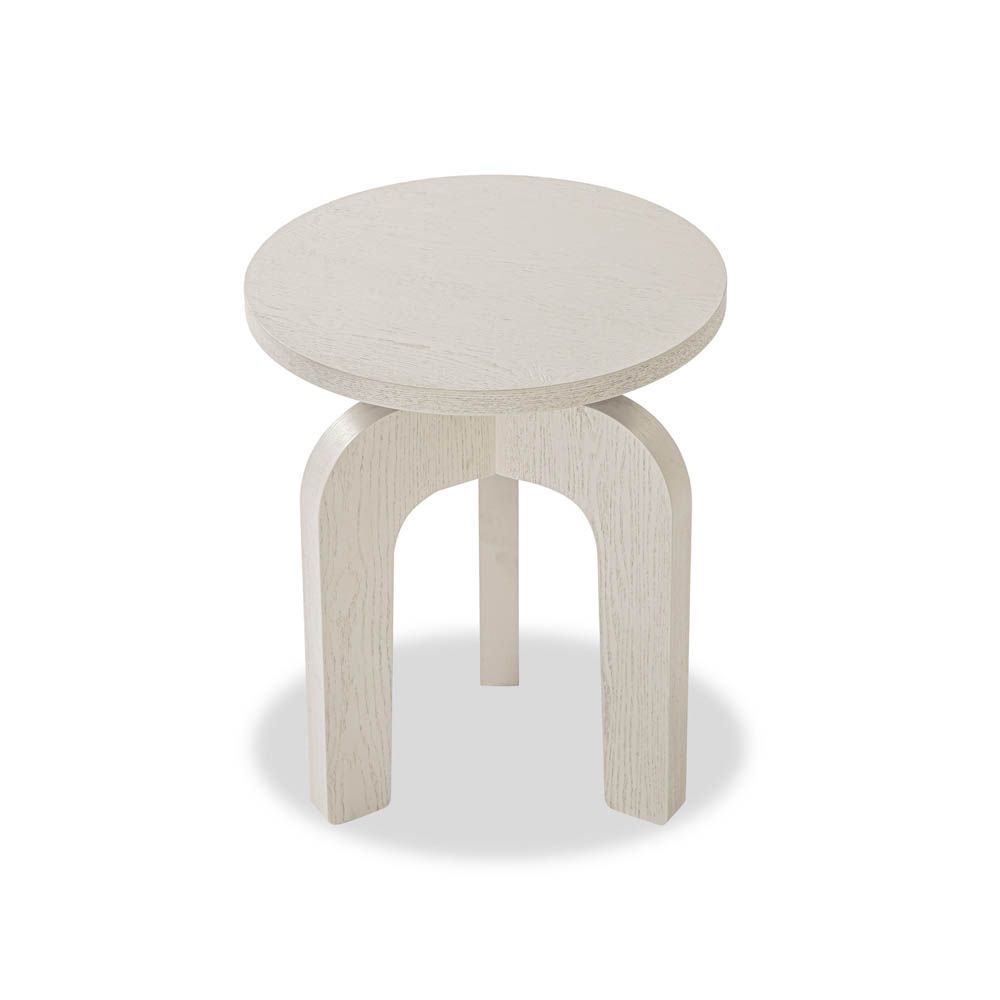 Bright, neutral and timeless round-topped side table with three legs and scandi silhouette