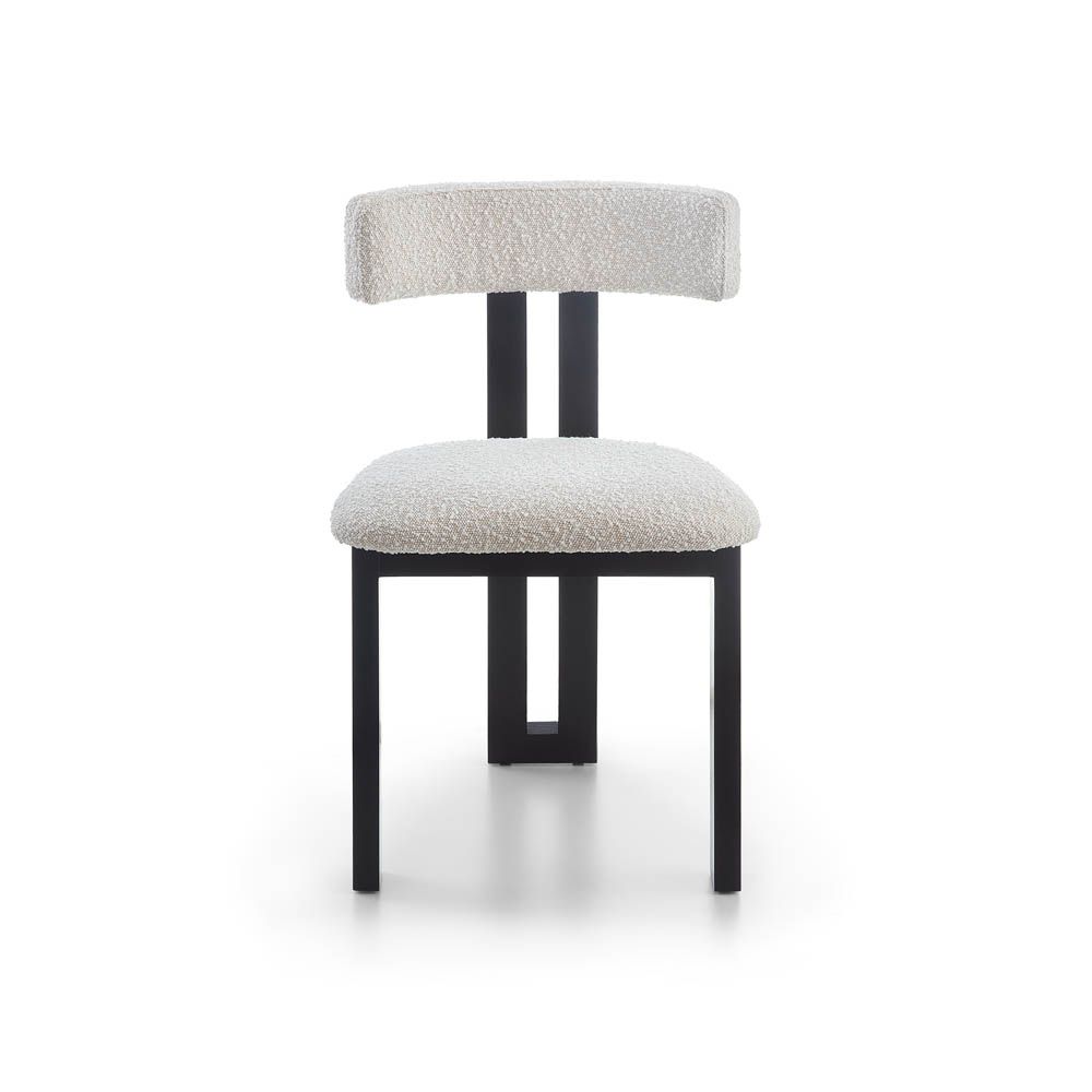 Elegant three-legged dining chair with boucle back rest and seat
