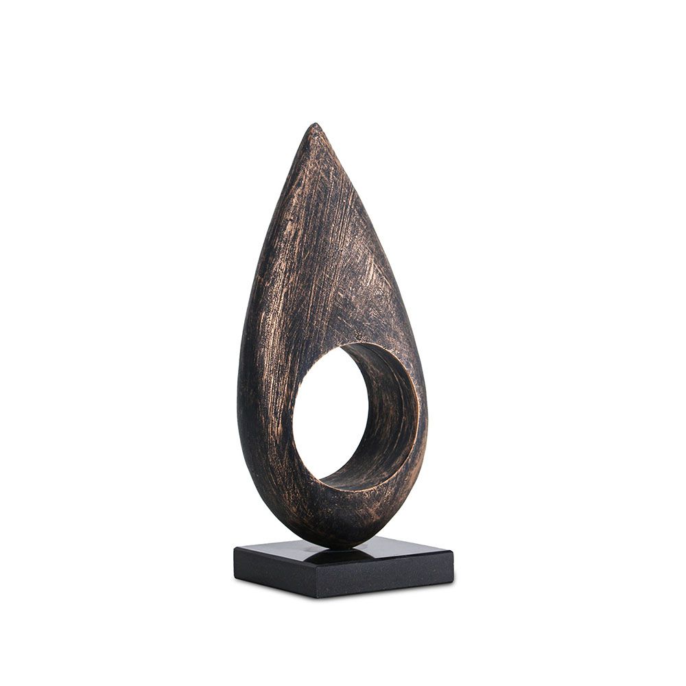 Coffee-coloured marble candle holder with cut-out design