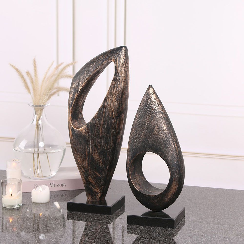 Coffee-coloured marble candle holder with cut-out design