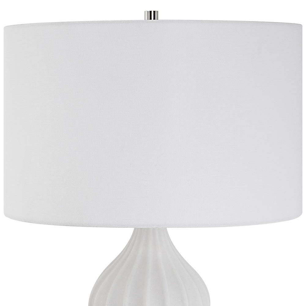 Curvaceous marble side lamp with three-dimensional details