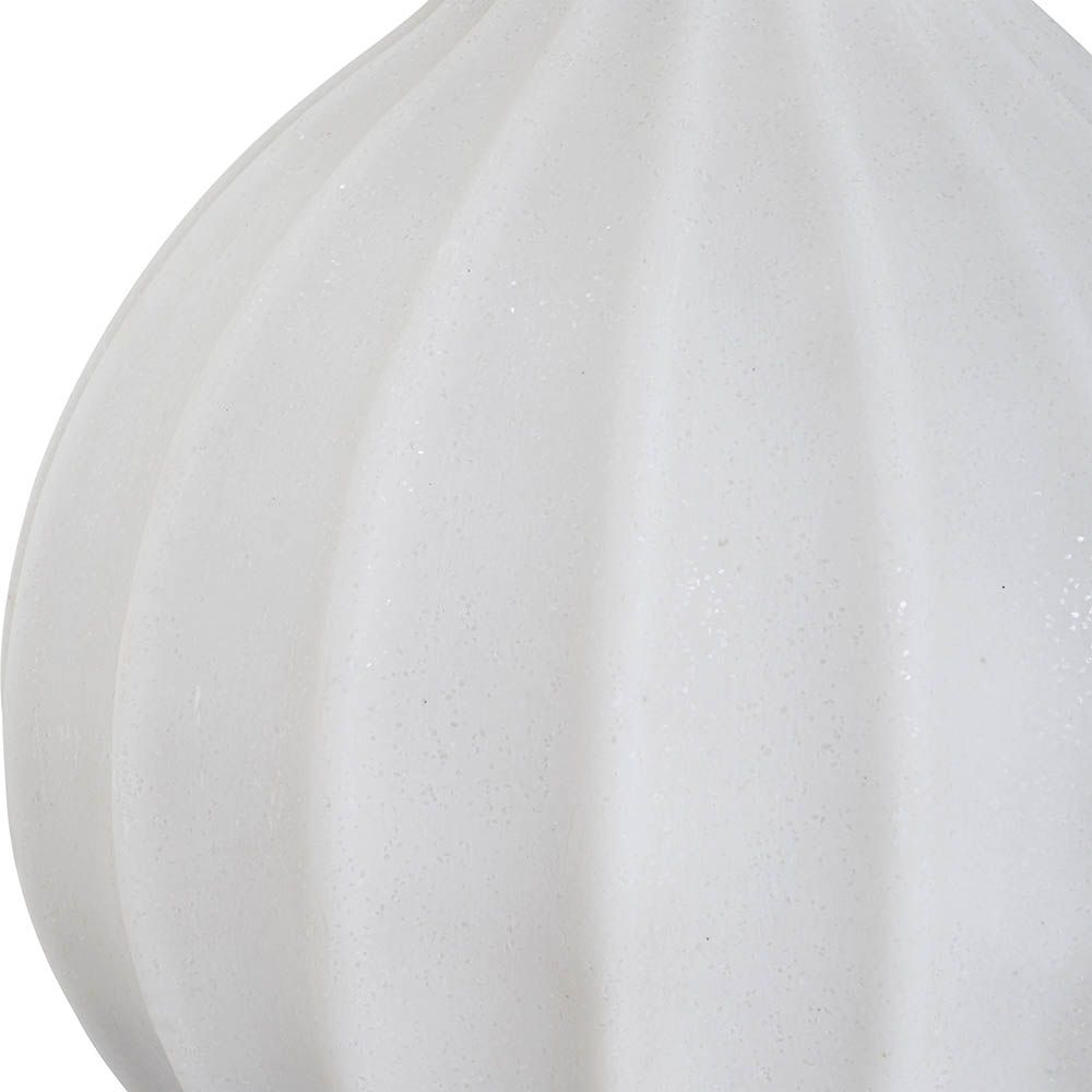 Curvaceous marble side lamp with three-dimensional details