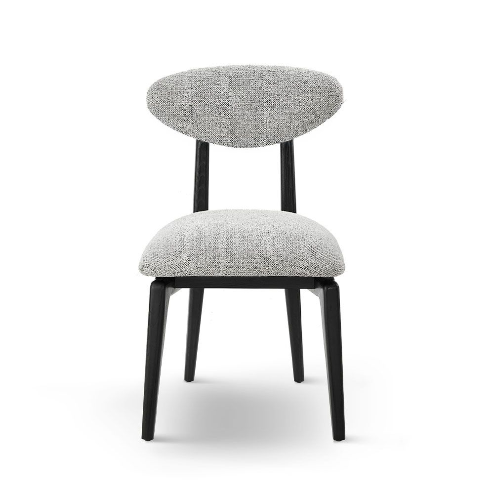 A statement dining chair with a gorgeous grey upholstery