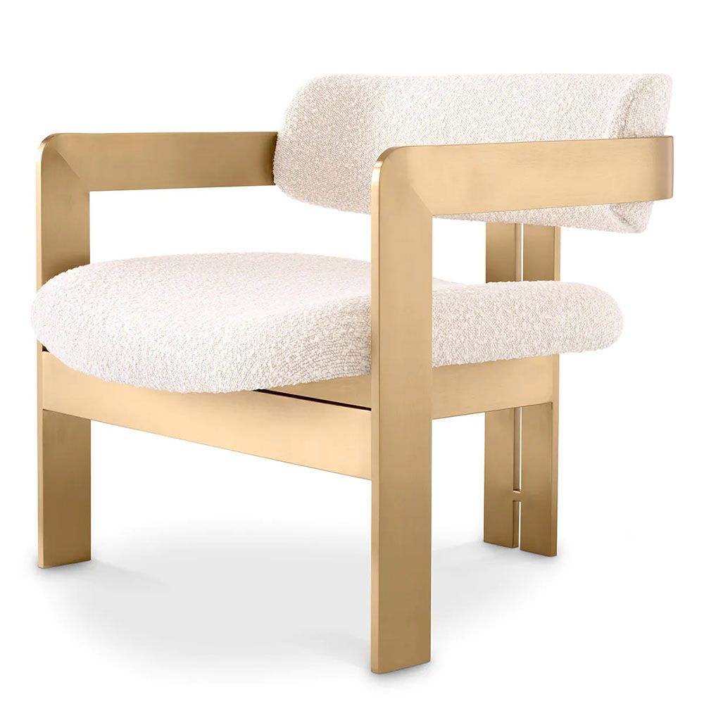 Chair with brushed brass frame and boucle finish seating and back pads