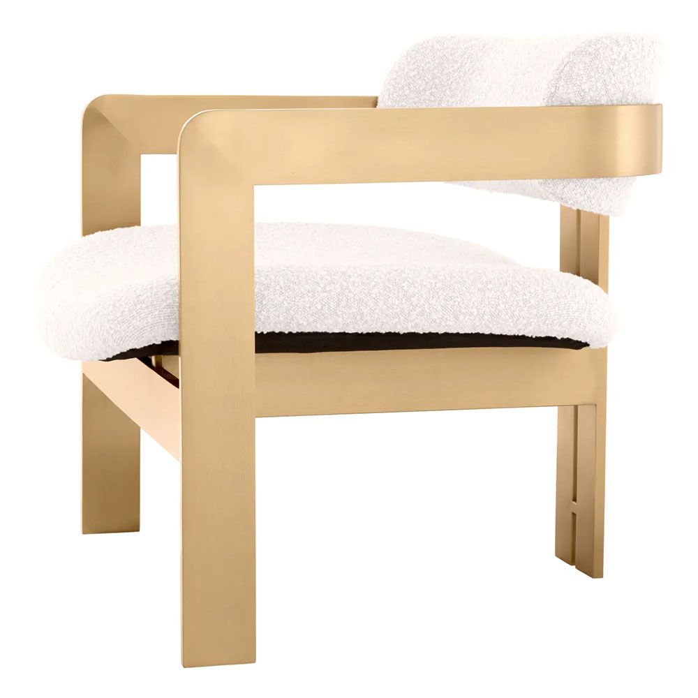 Chair with brushed brass frame and boucle finish seating and back pads