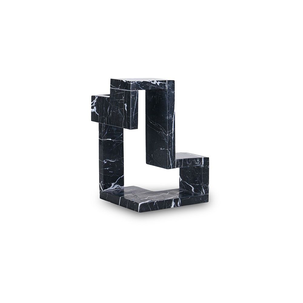 Beautiful black marble sculpture in geometric design