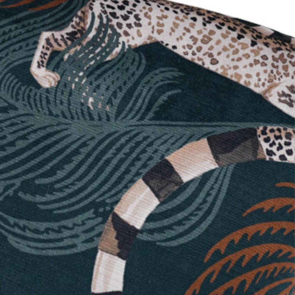 teal cushion with a leopard design