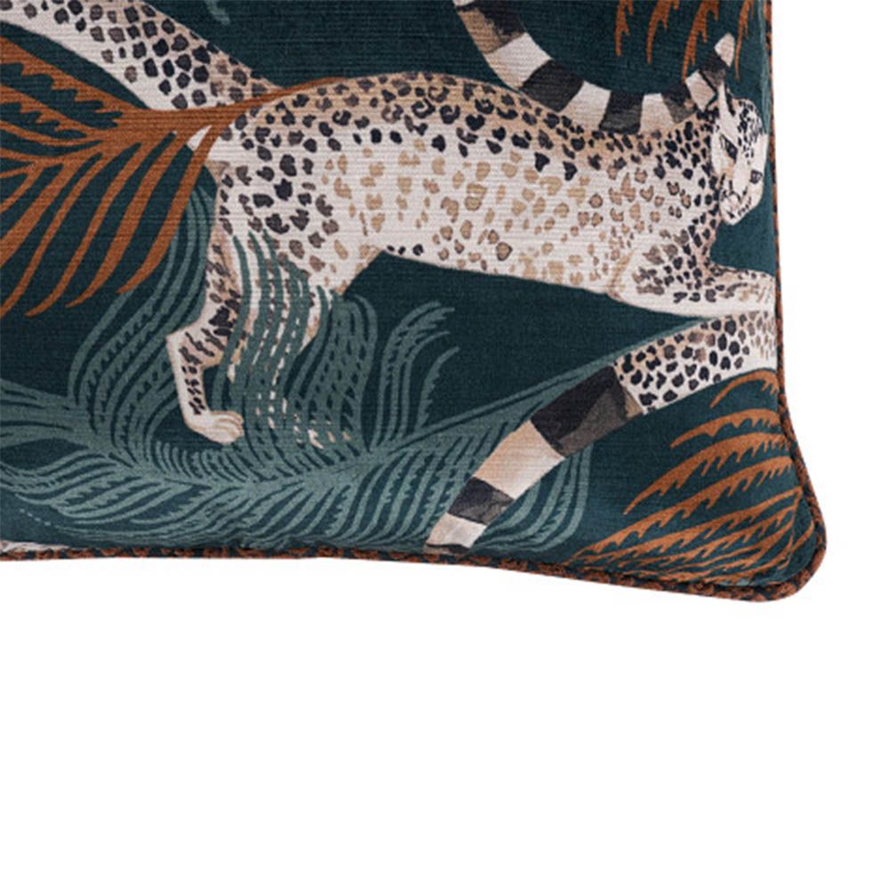 teal cushion with a leopard design