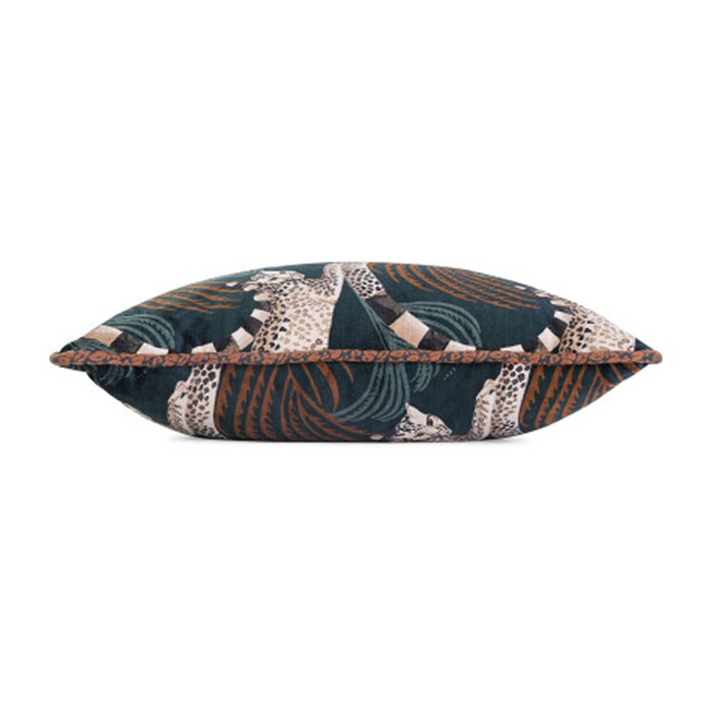 teal cushion with a leopard design