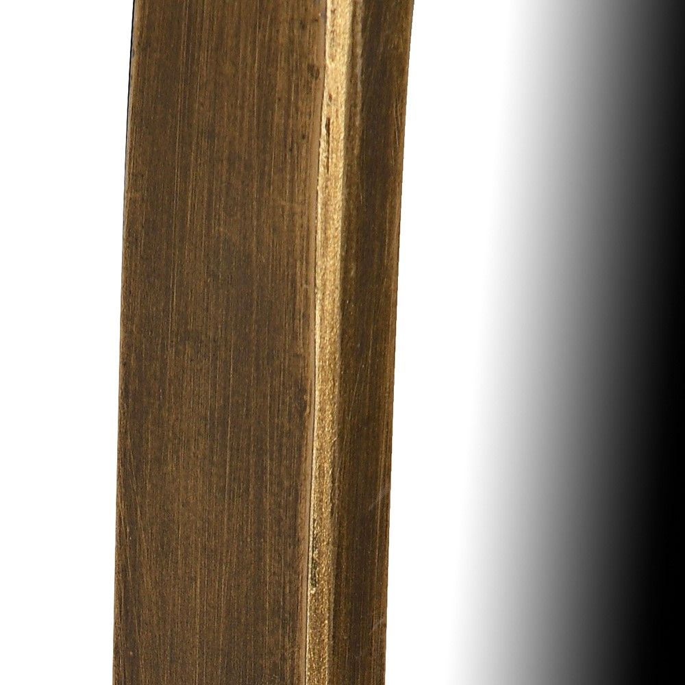 Organic shaped wall mirror with warm dark metal frame