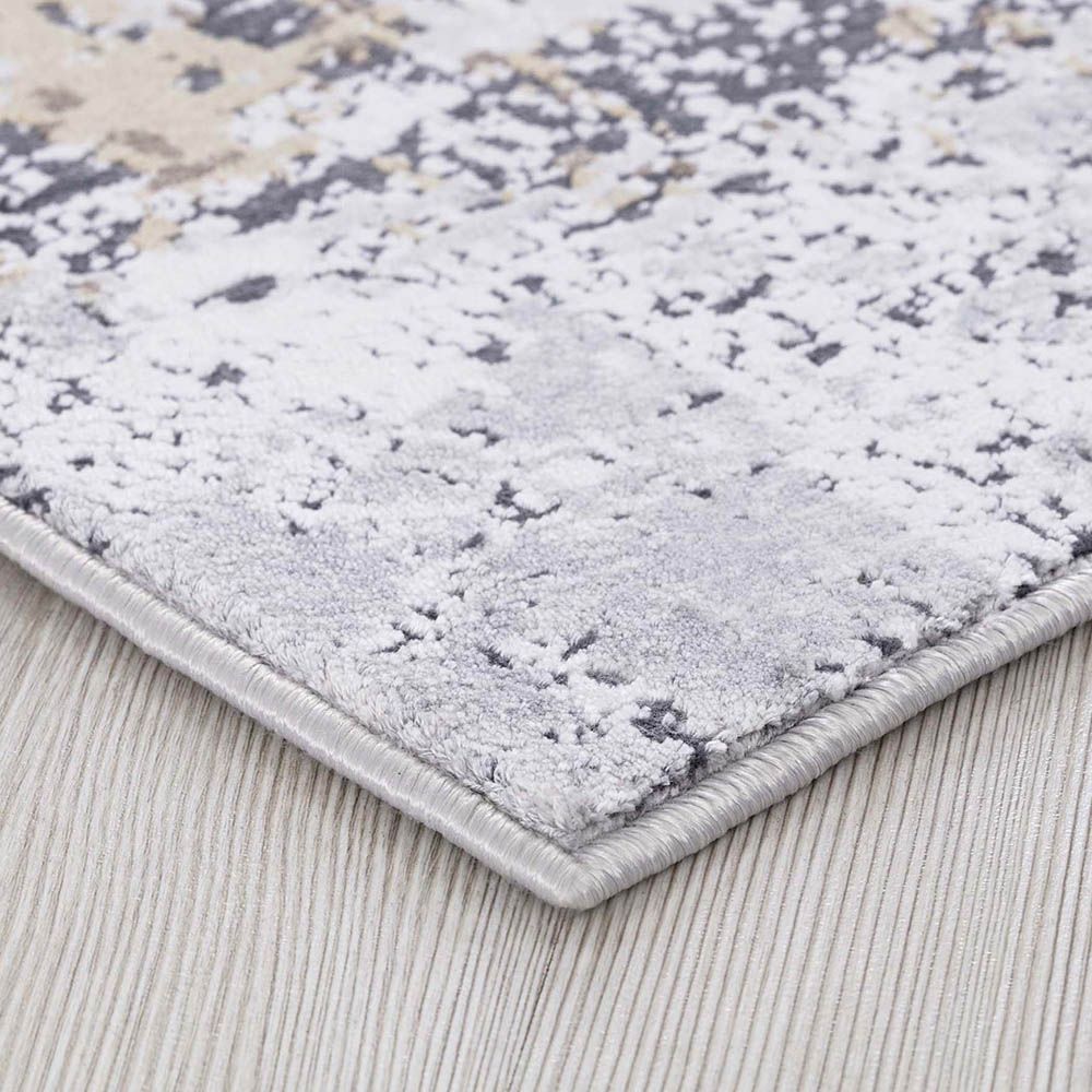 Abstract grey rug with taupe gold detailing