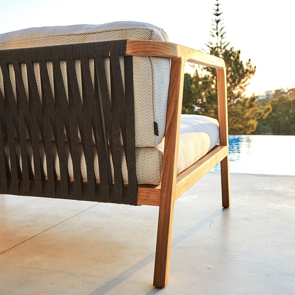 A luxury love seat from Skyline Design with beautiful bespoke cushions