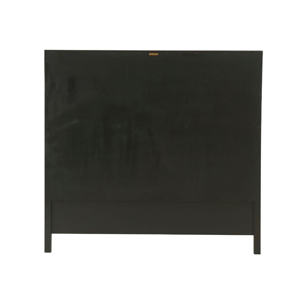 A stunning bed from Theodore Alexander with a neutral, deep-buttoned headboard and a dark solid beech frame