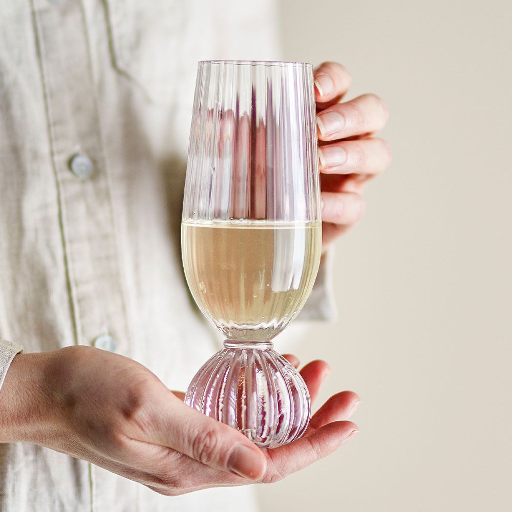 Ribbed champagne flute with unique silhouette