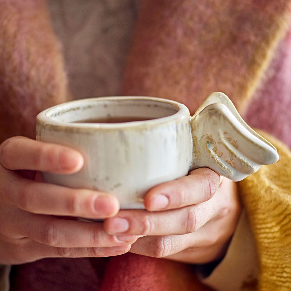Blue and white mug with angel wing handle