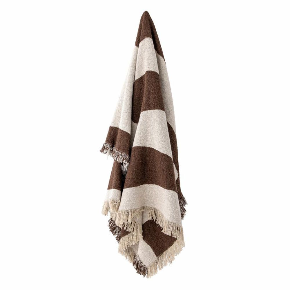 Natural throw with abstract brown design and tassels