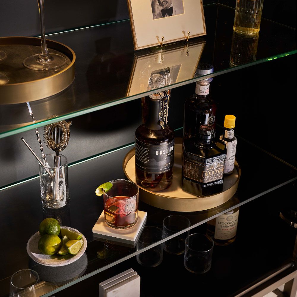 Dazzling drinks cabinet with sunburst style aged brass finish