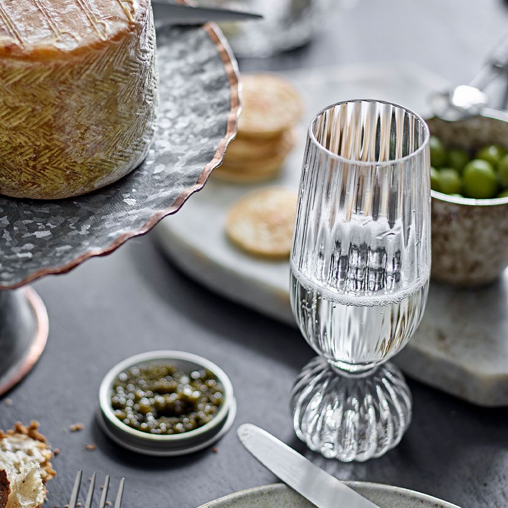 Ribbed champagne flute with unique silhouette
