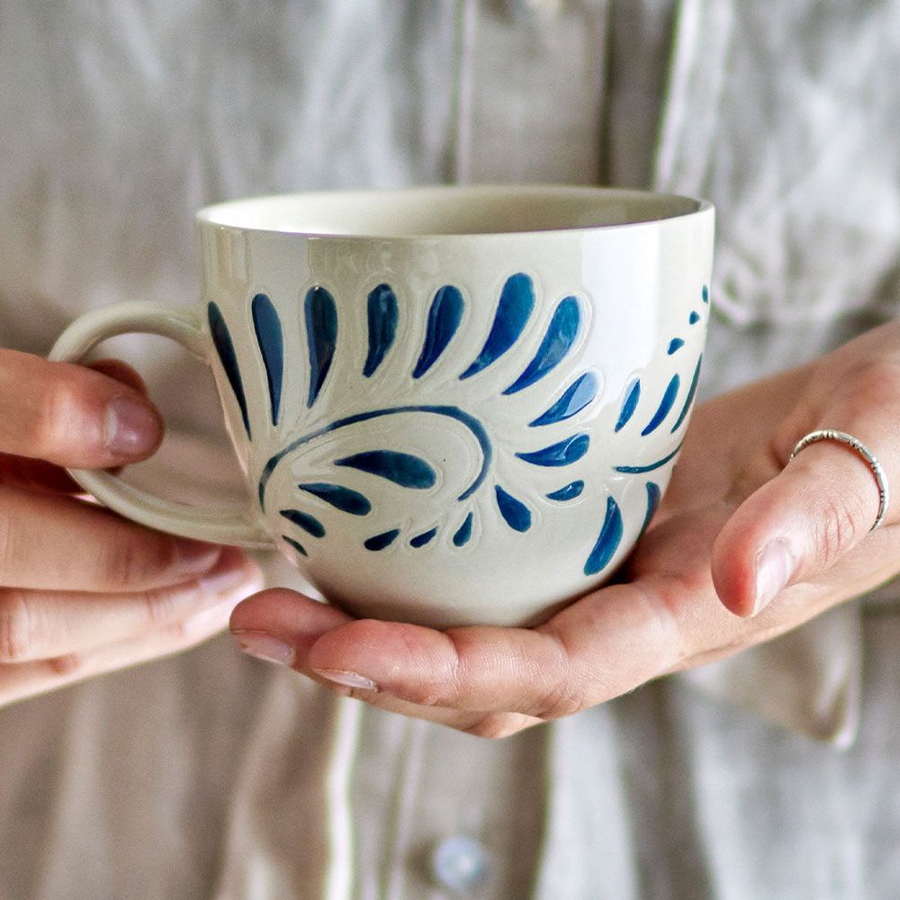 White mug with paisley blue details