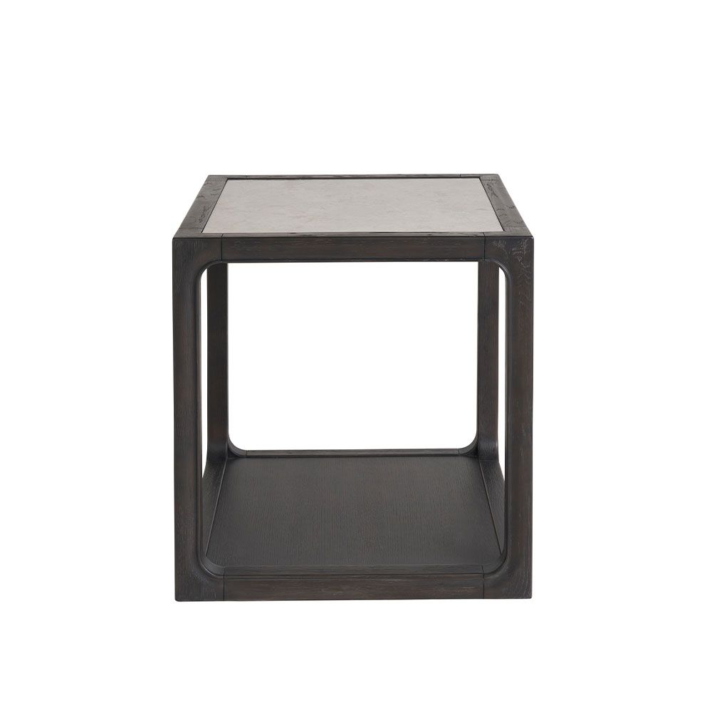 Side table with elegant marble details combining soft curves with hard lines