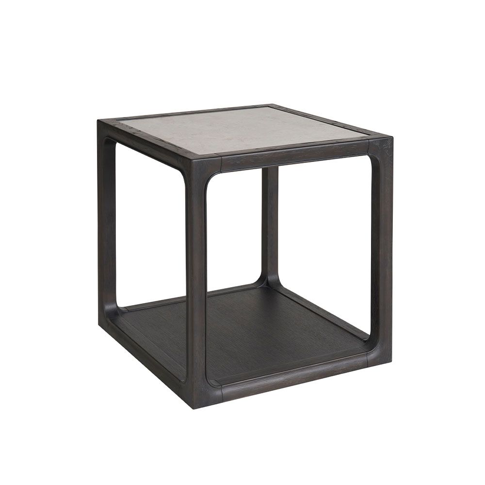 Side table with elegant marble details combining soft curves with hard lines