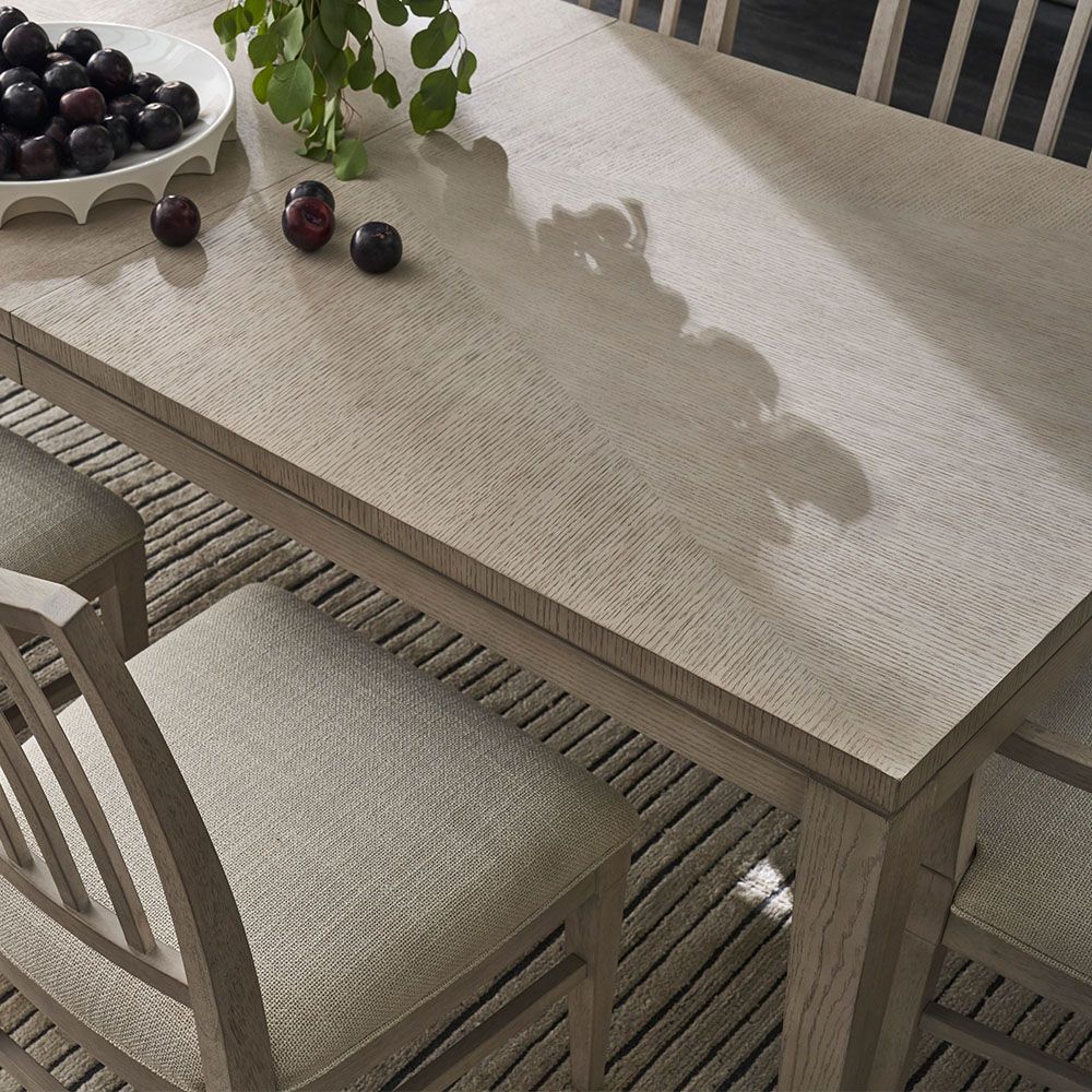Wooden dining table in grey finish and four legs