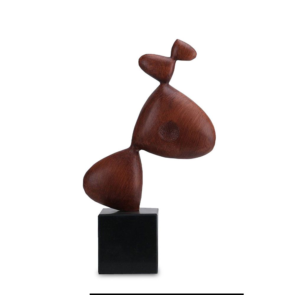 Captivating sculpture composed of red resin and sleek black marble
