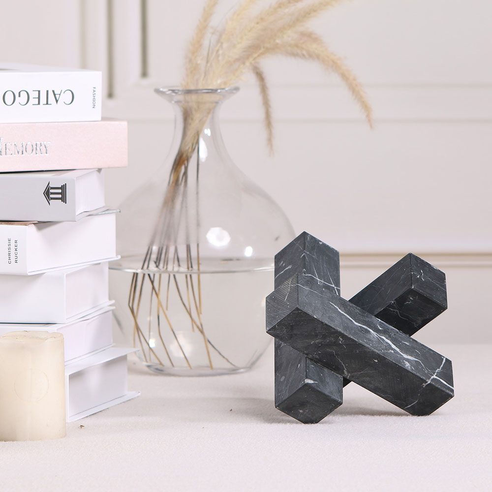 Elegant black marble sculpture in geometric design