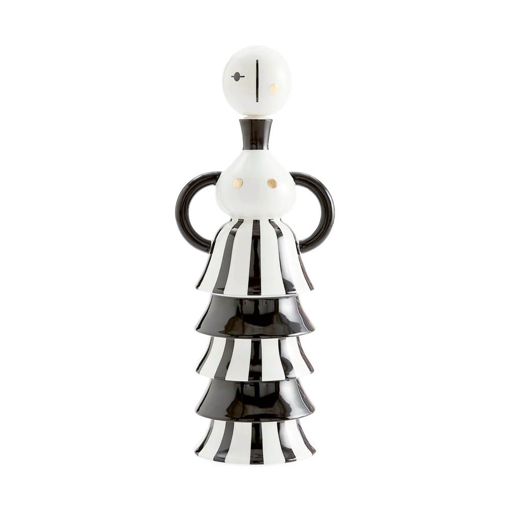 A statement decanter by Jonathan Adler with an artistic design and gold details