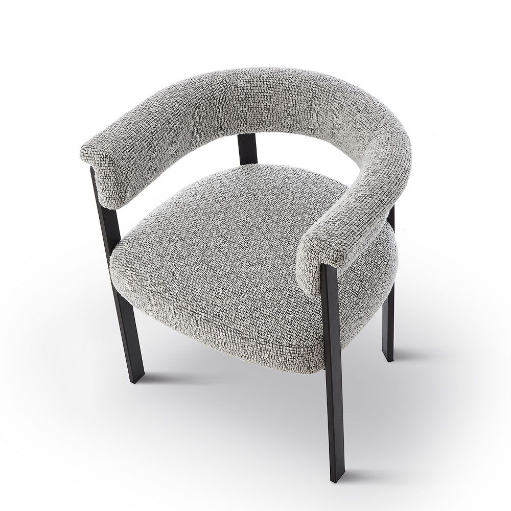 Elegant boucle upholstered dining chair in grey with black frame