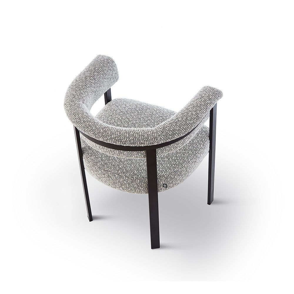 Elegant boucle upholstered dining chair in grey with black frame