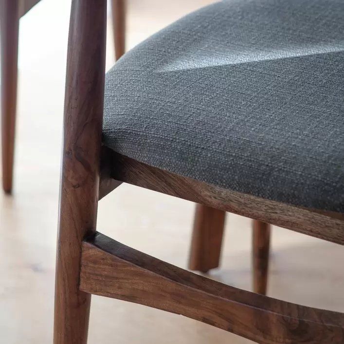 Retro inspired dining chair with grey fabric and walnut stained wooden frame