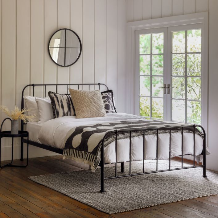 Double black bed frame with ironwork style details