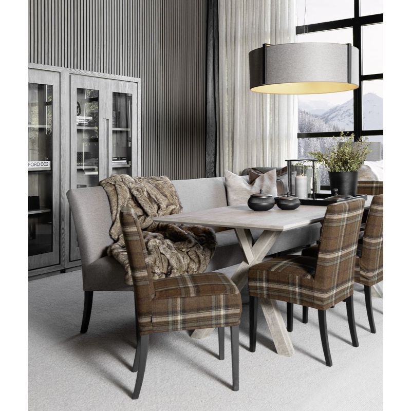 Large, grey rectangular dining table with crossed legs at either end